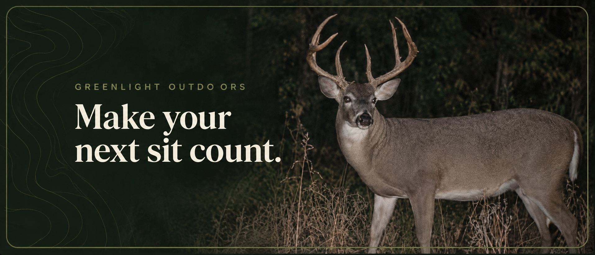 A large whitetail buck in the woods. GreenLight Outdoors: Make your next sit count.
